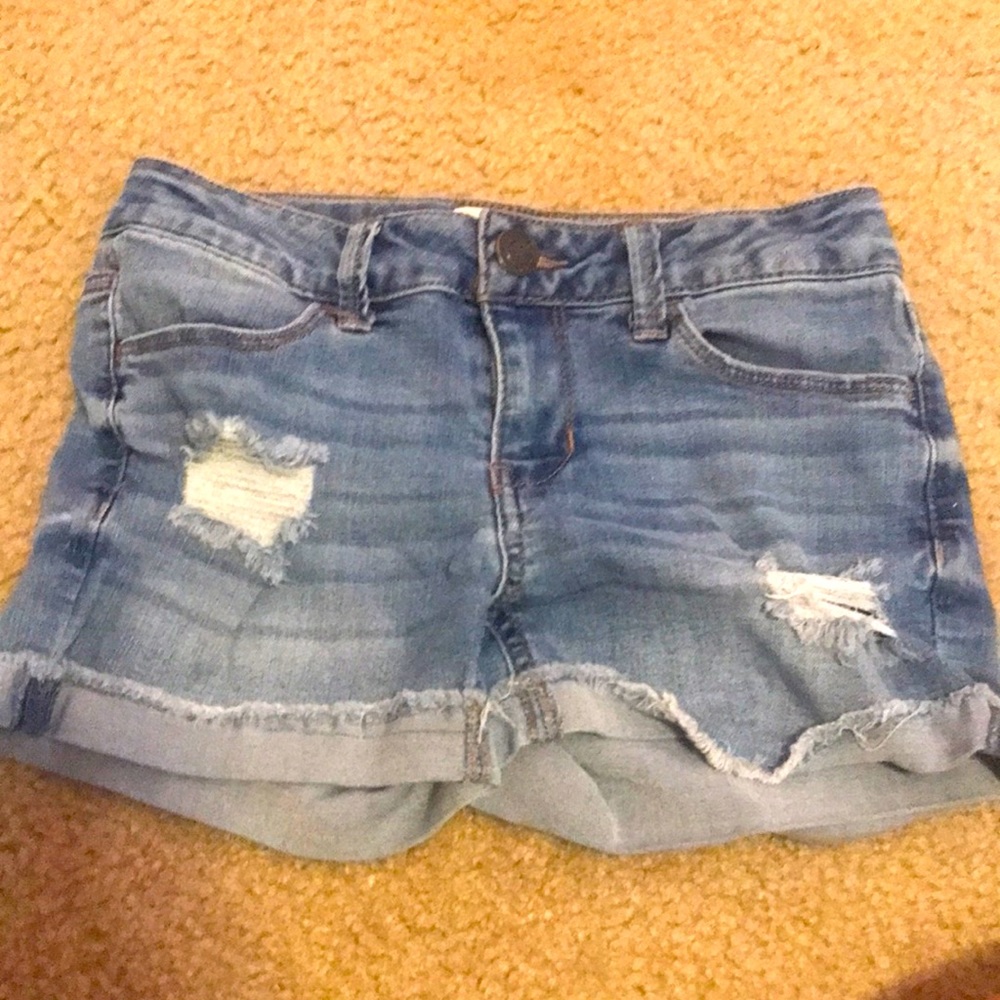 Jean shorts with rips girls